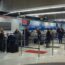 people standing in a line at an airport