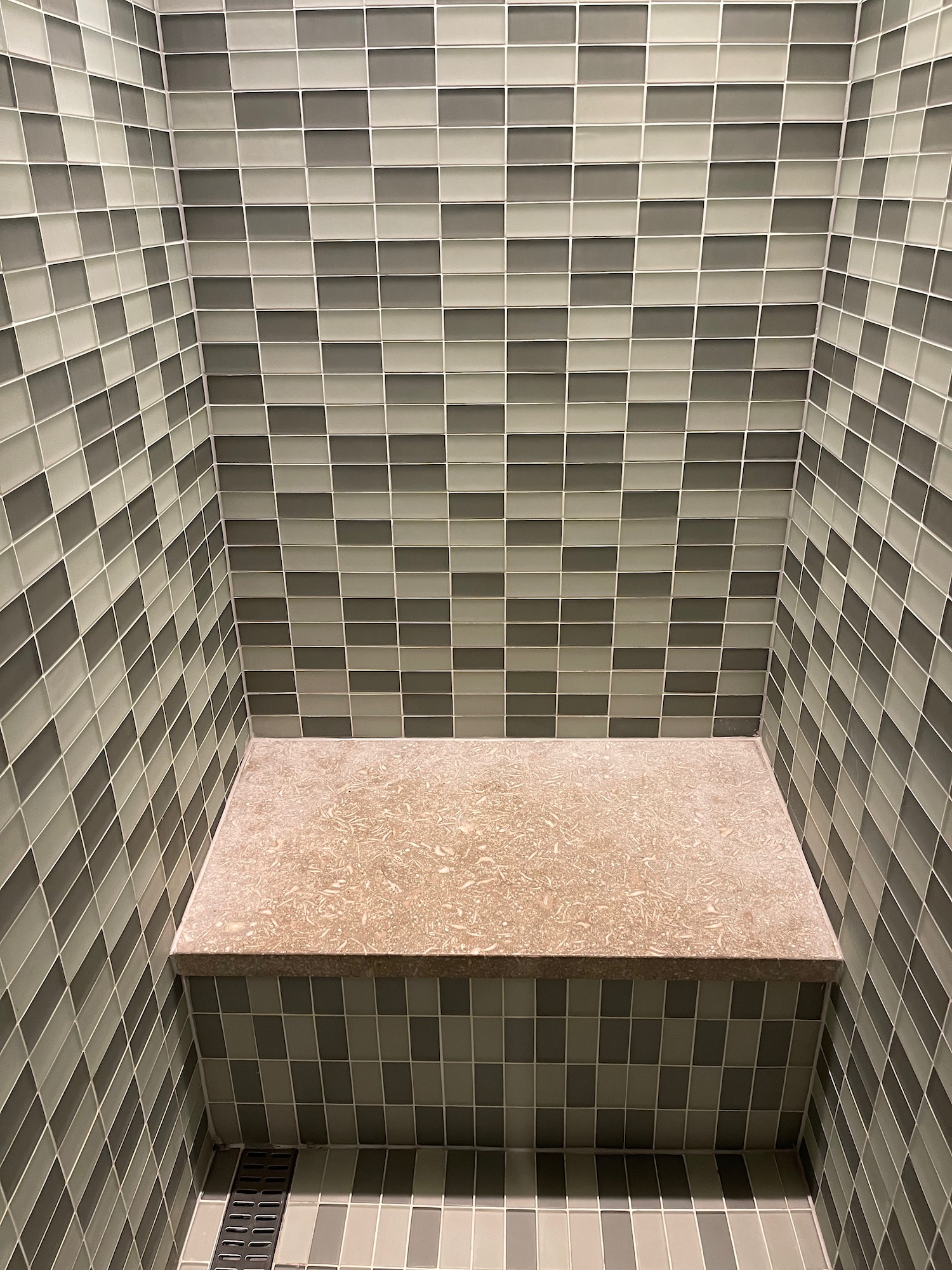 a bench in a shower