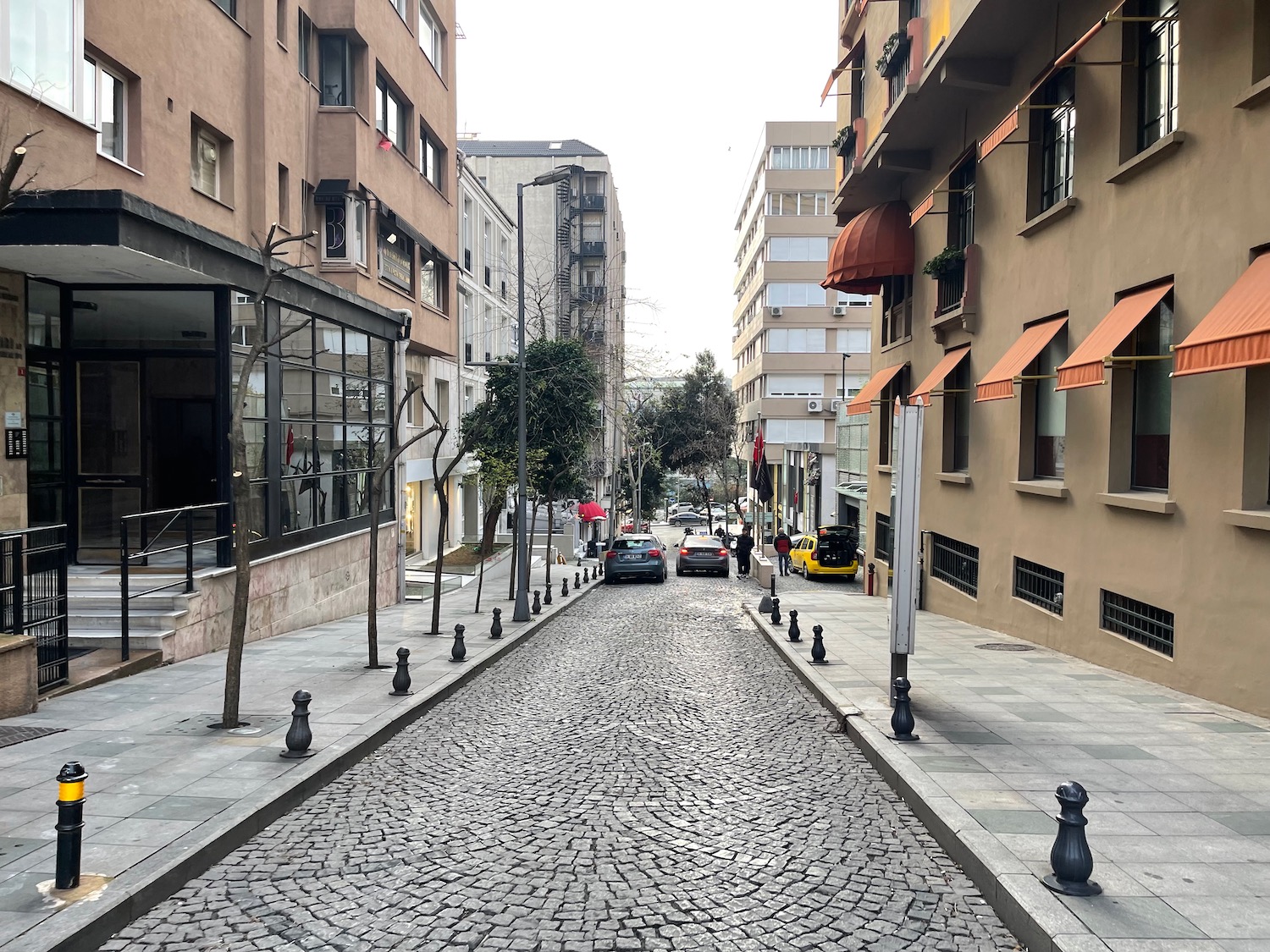 a street with buildings and cars