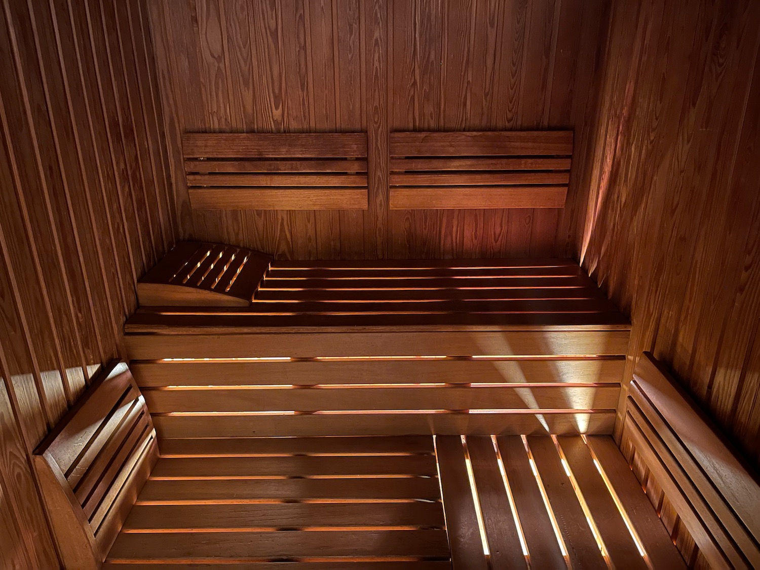 a wooden bench in a sauna