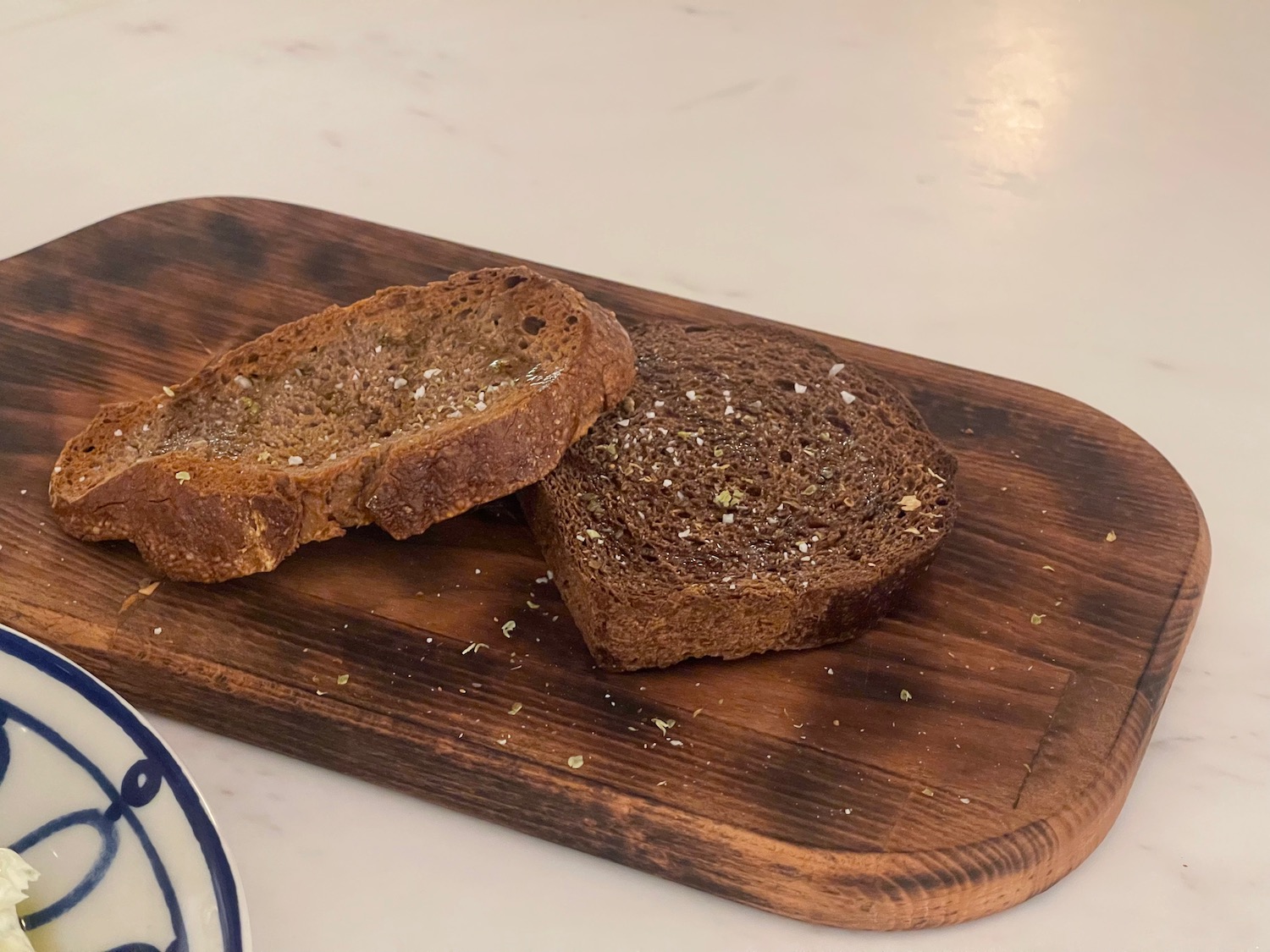 a piece of bread on a cutting board