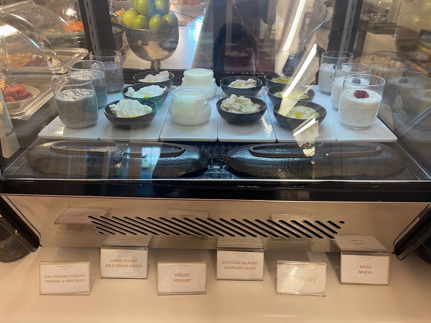 a display case with different types of food