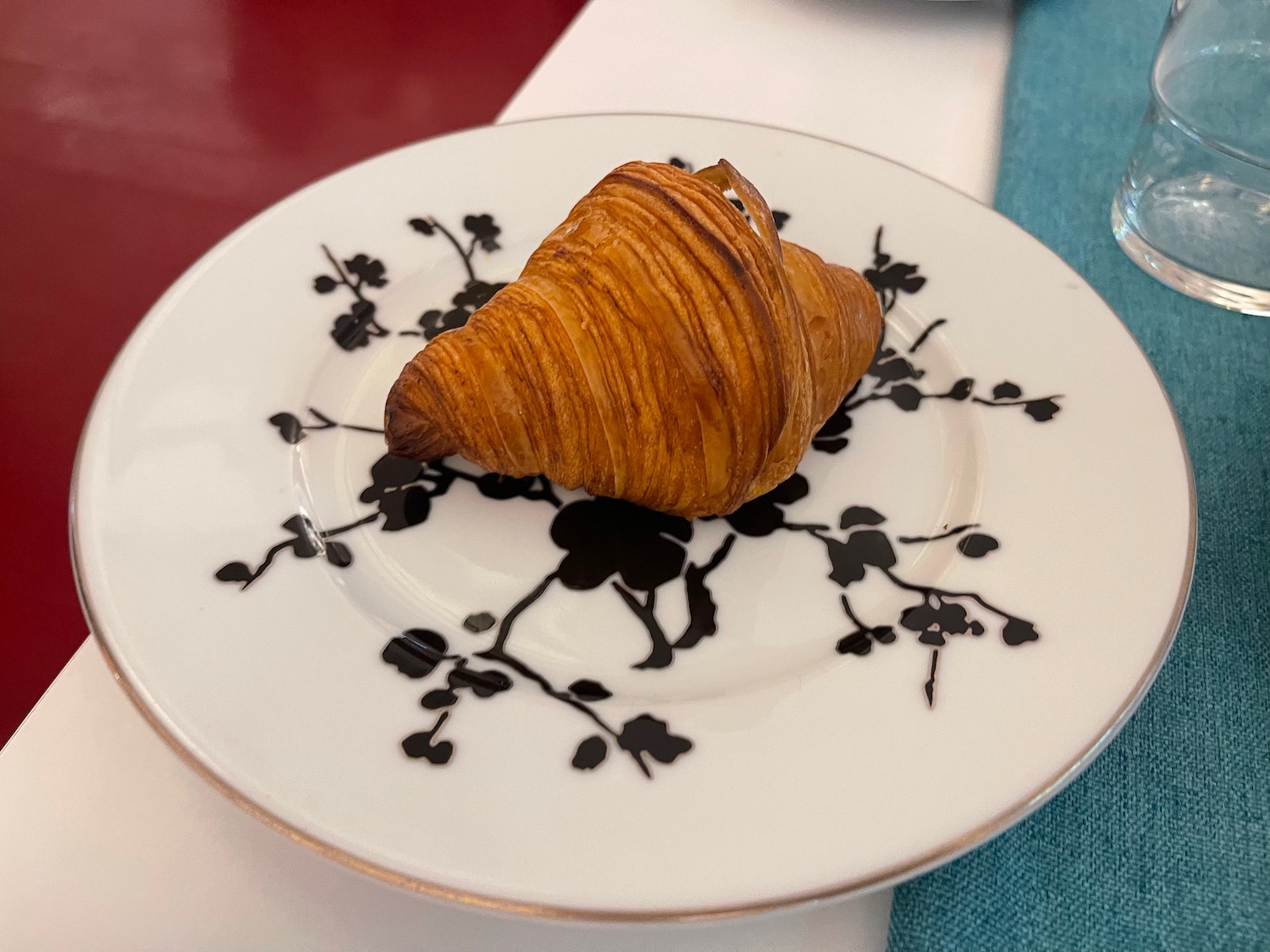 a croissant on a plate