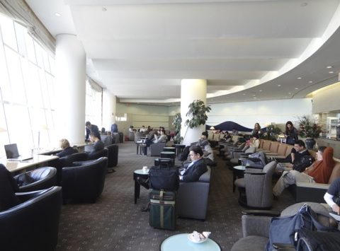 a group of people sitting in a waiting room