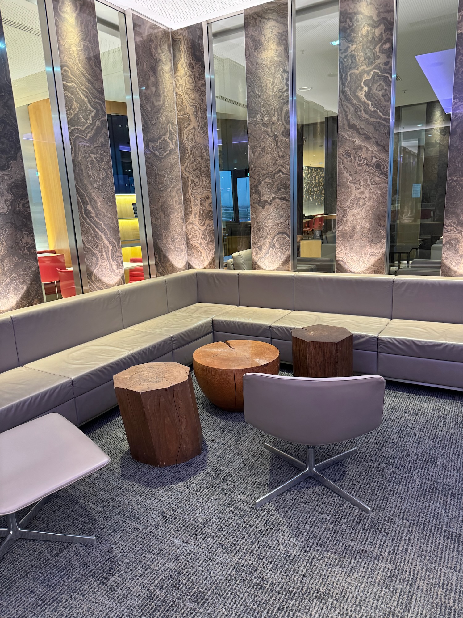 a couch and chairs in a room