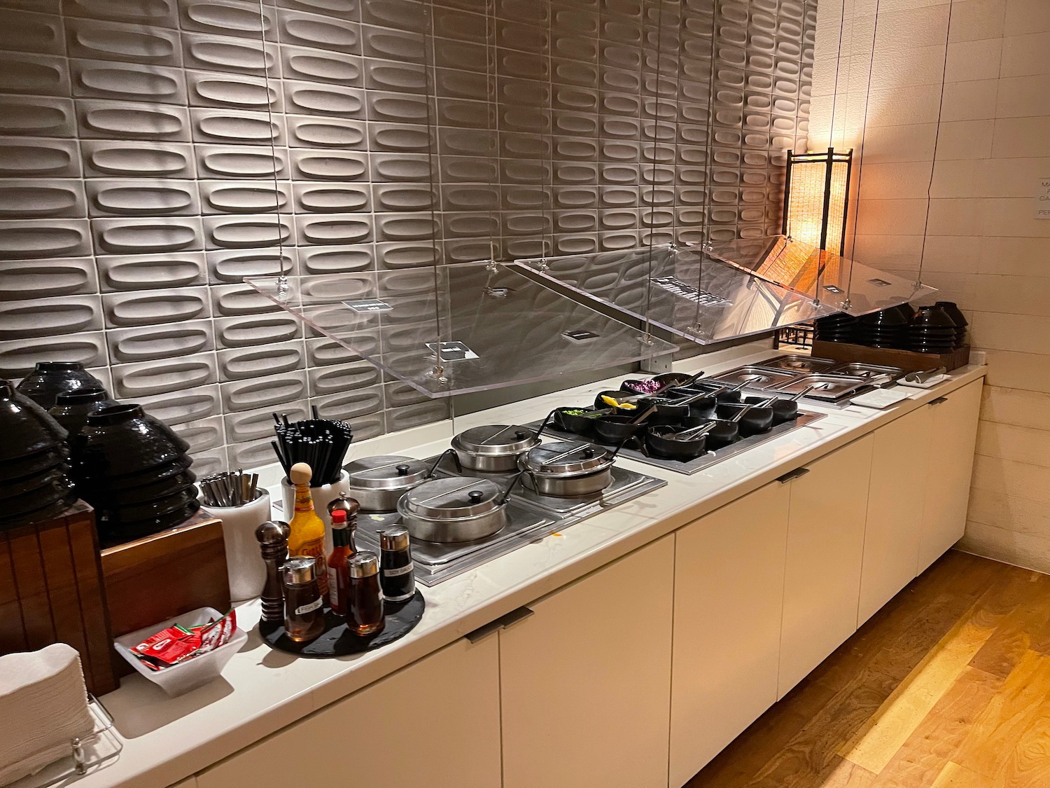 a kitchen with a counter top and a pan on it