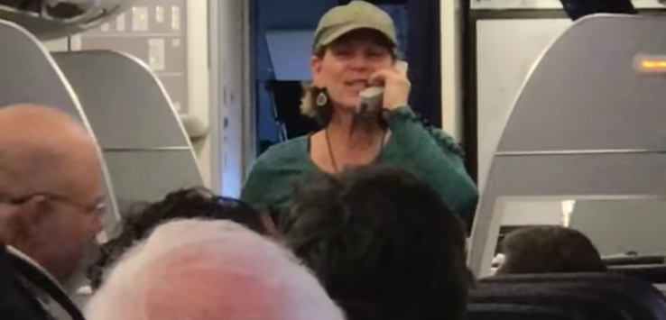 a woman talking on a phone in an airplane