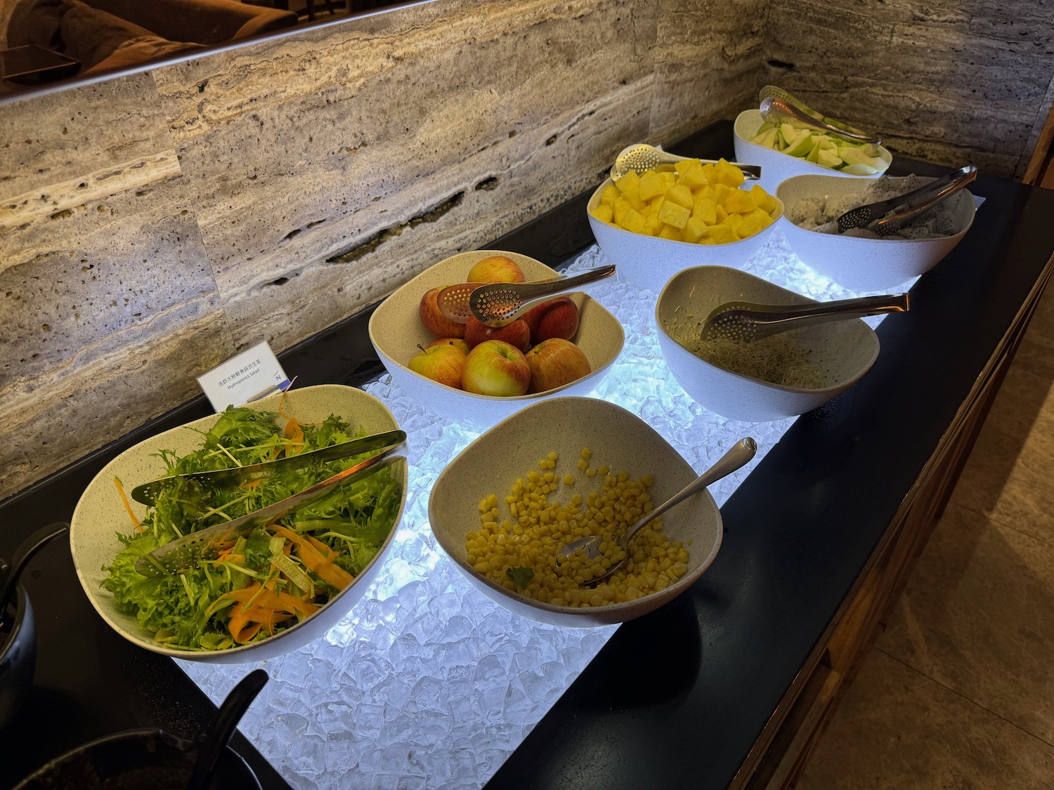 a group of bowls of food on a table