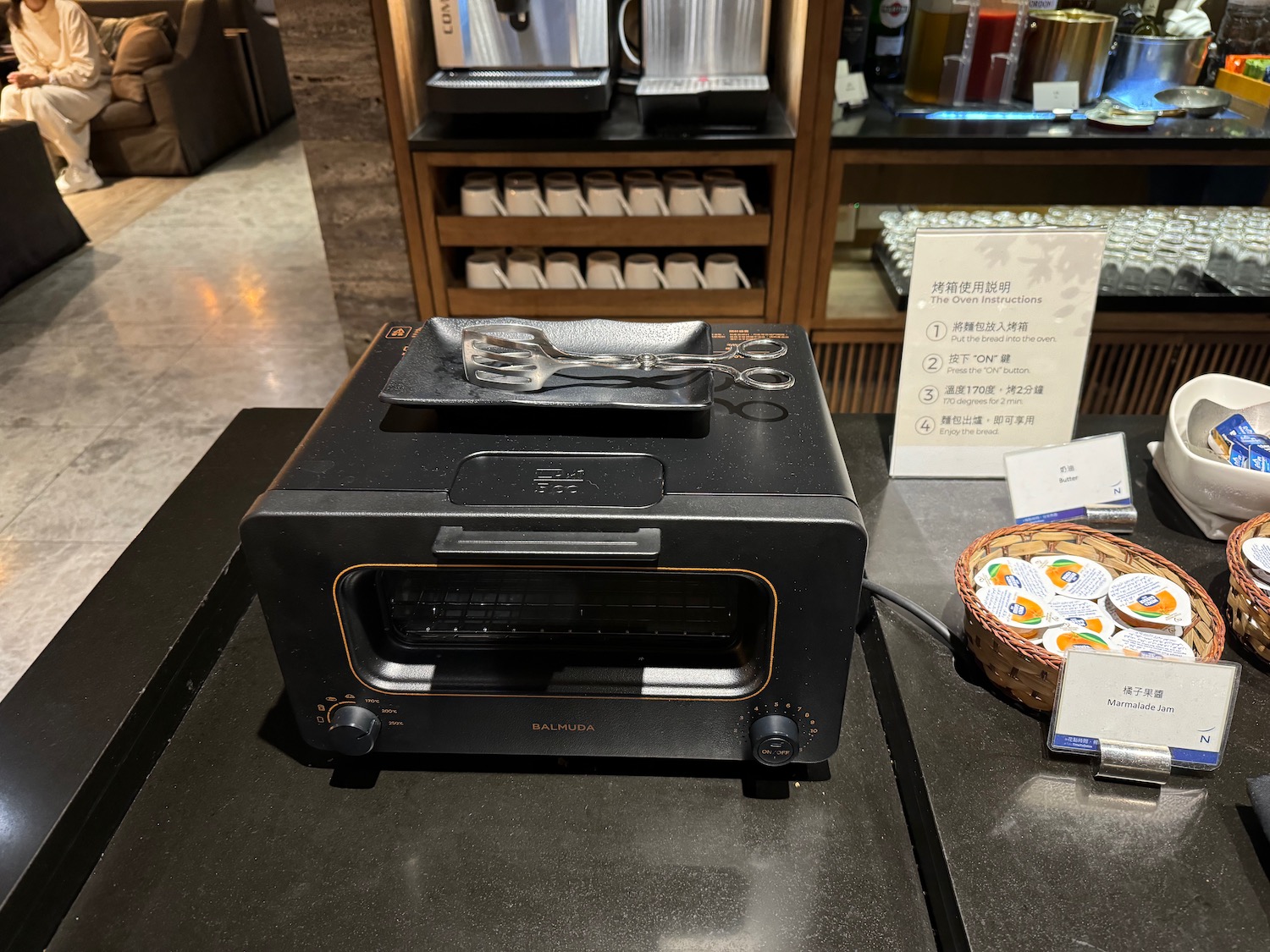 a black toaster oven on a counter