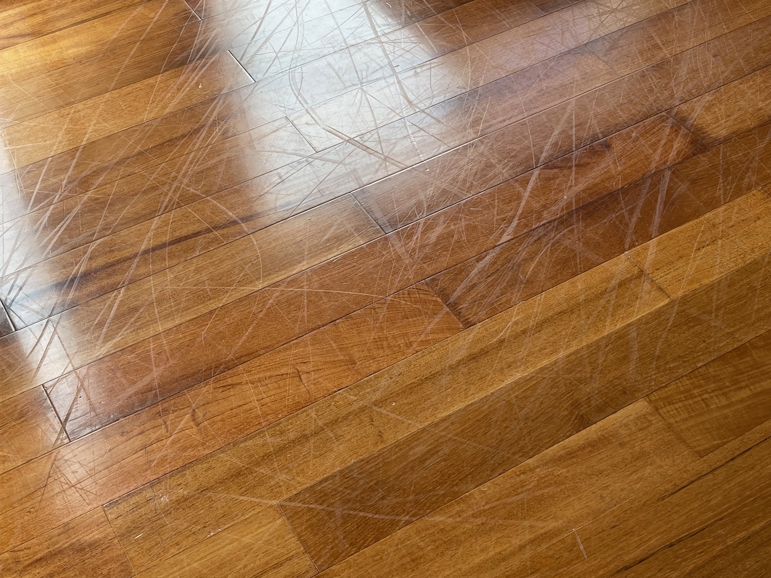a wood floor with scratches on it