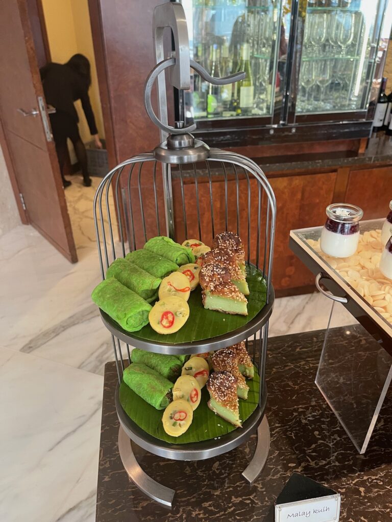 a bird cage with food on it
