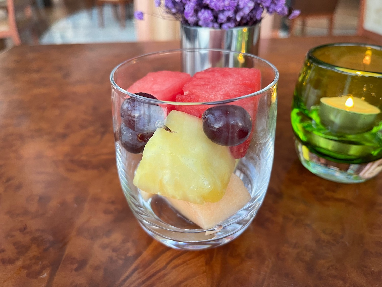 a glass with fruit in it