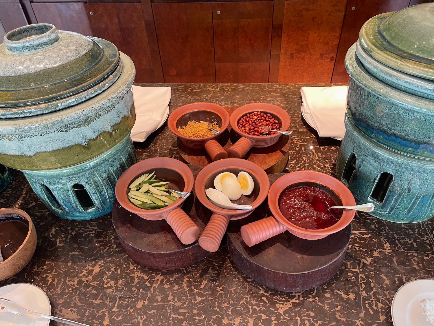 a group of bowls with food in them