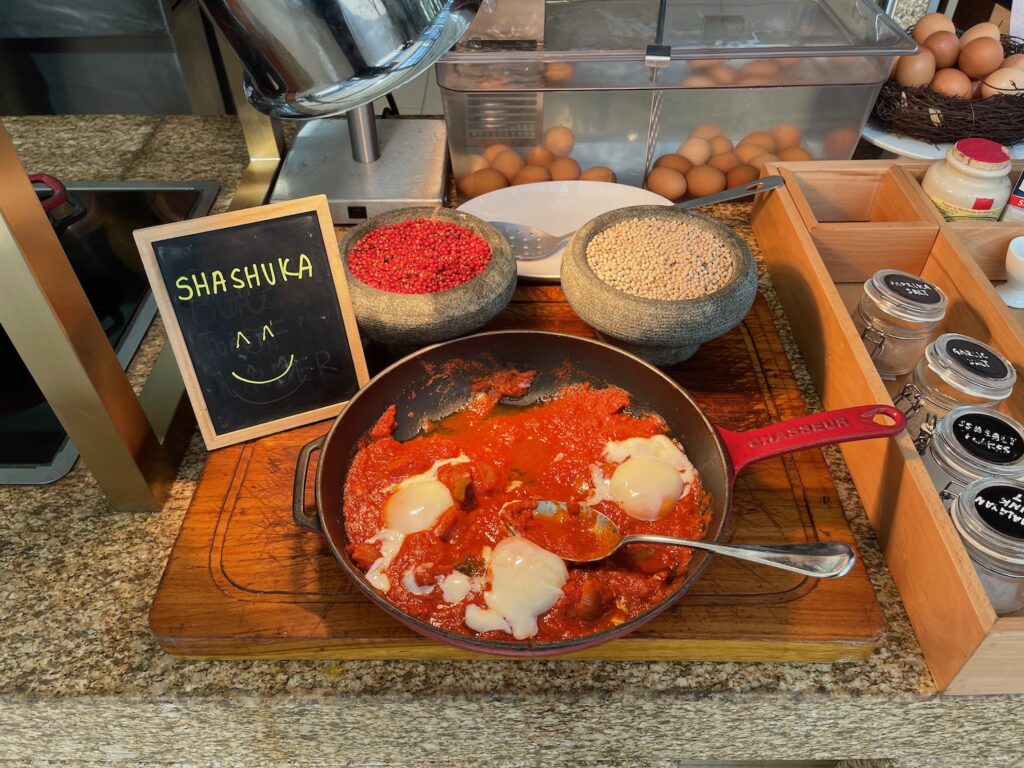 a pan of food on a cutting board