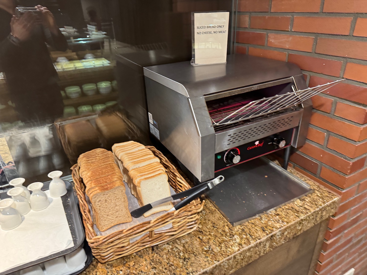 a toaster oven and bread in a basket