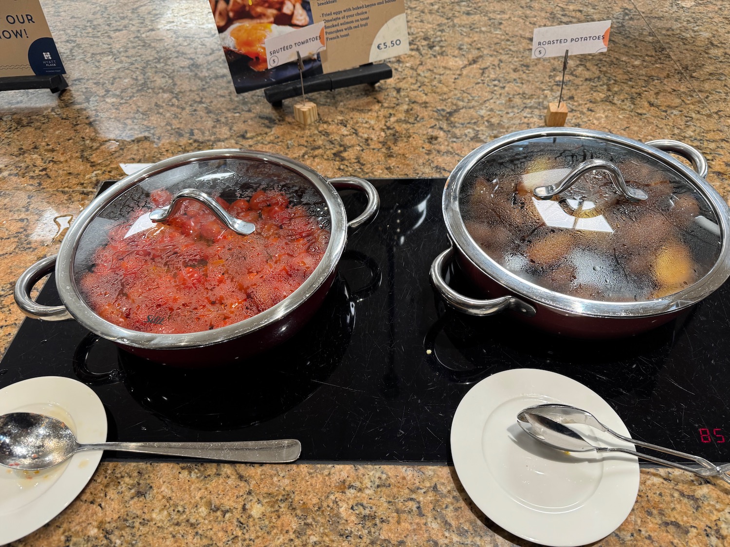 a couple of pots with food in them
