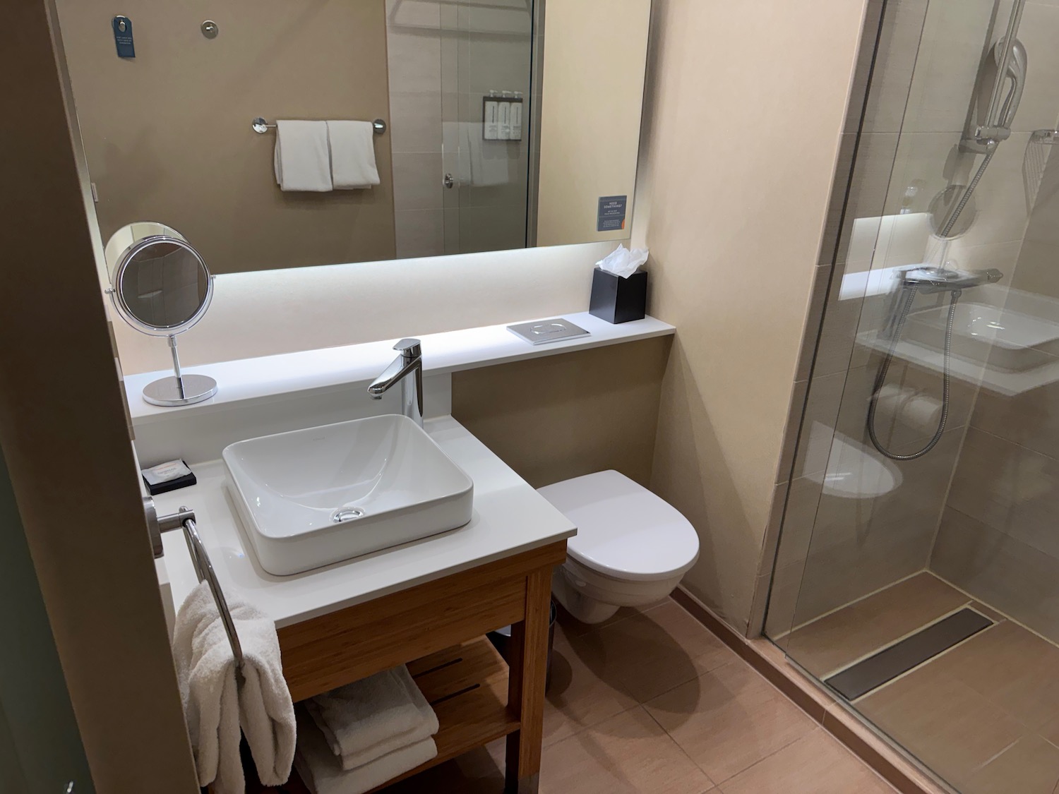 a bathroom with a mirror and sink