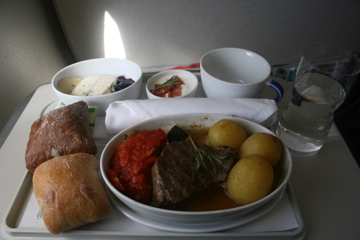 a plate of food on a tray