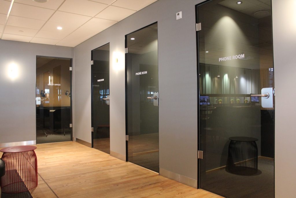a row of glass doors in a room