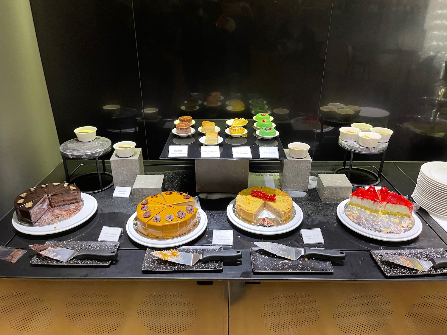a table with different cakes on it
