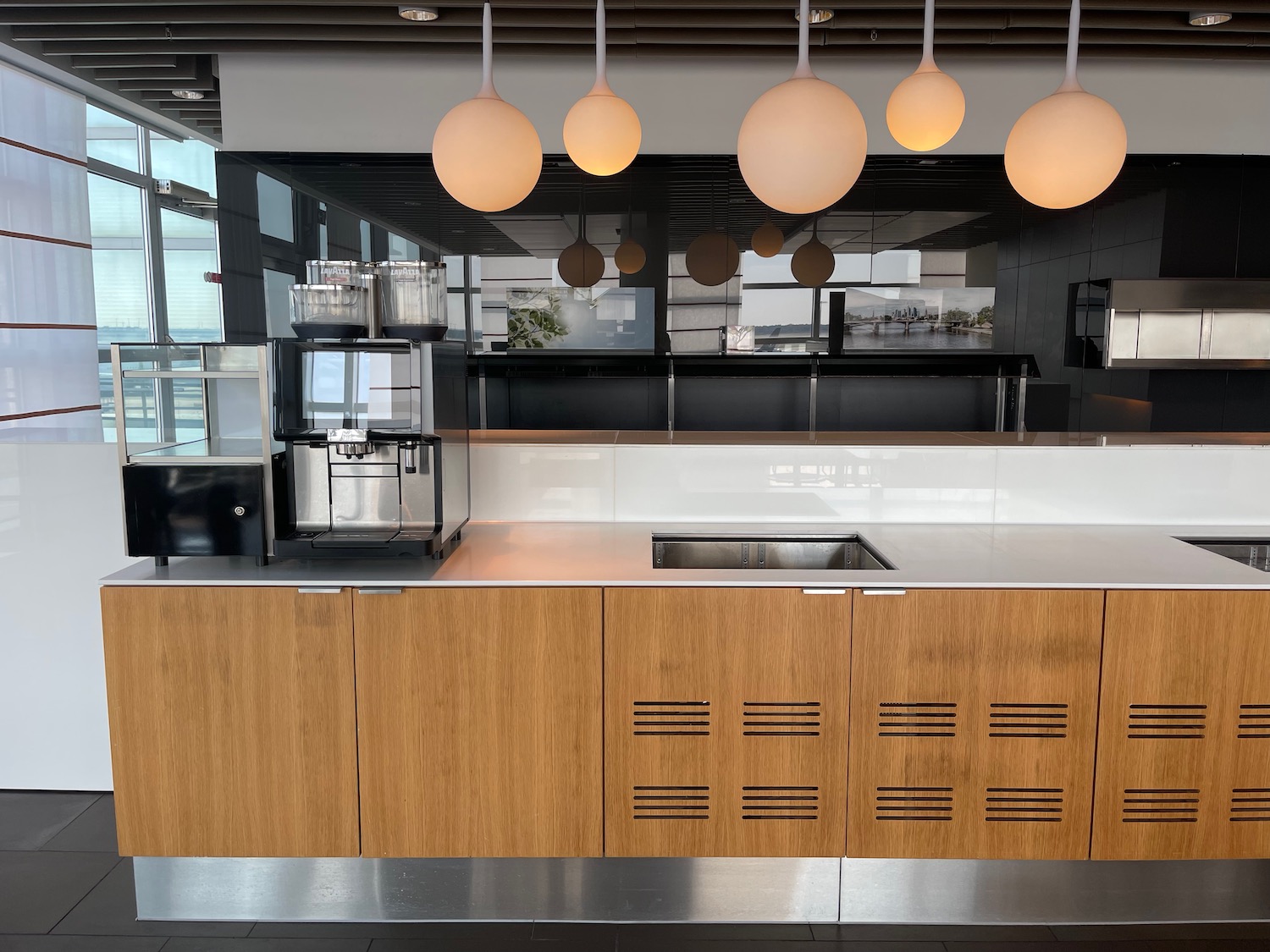 a kitchen with a counter and light bulbs