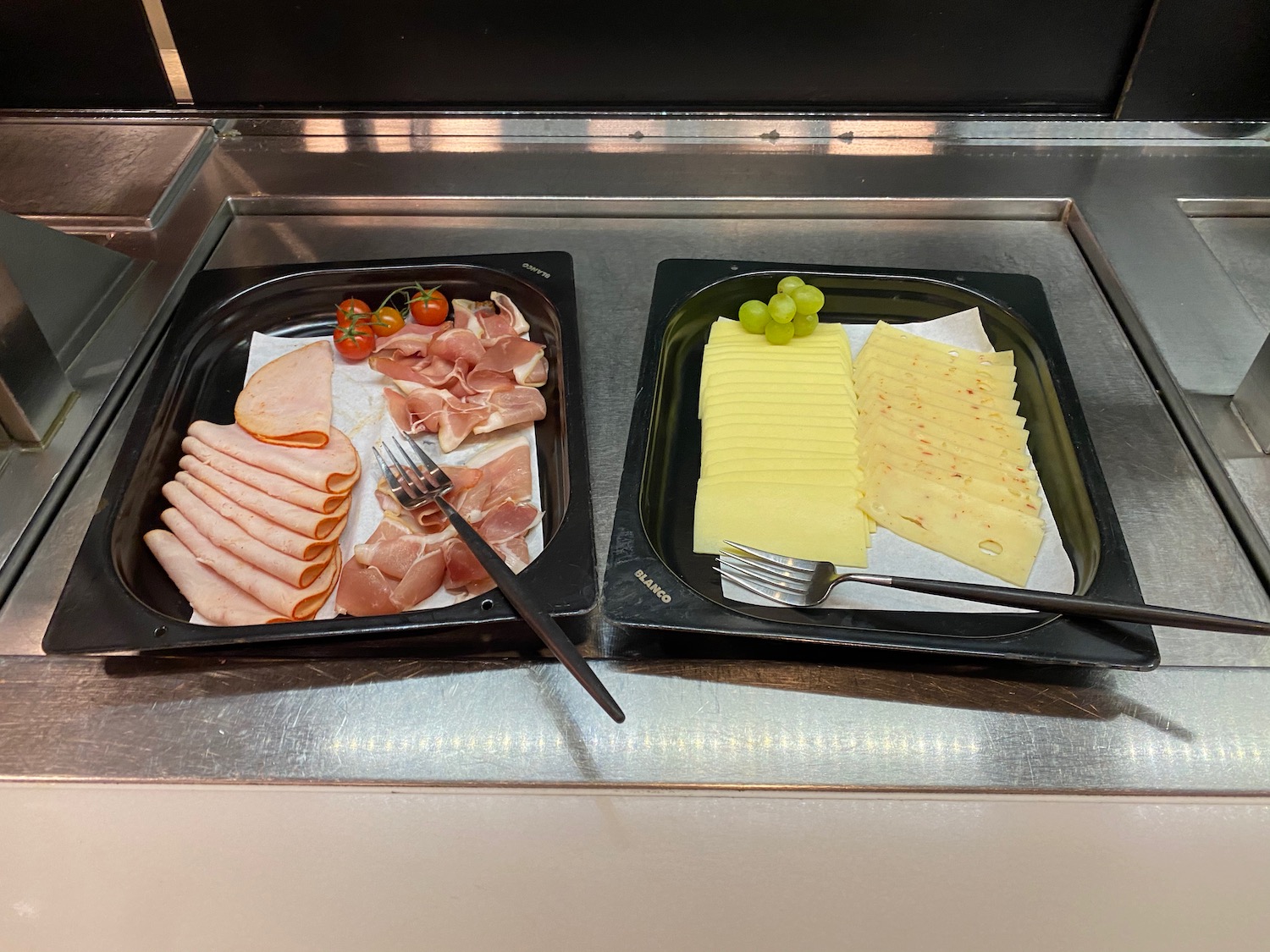 trays of food on a counter