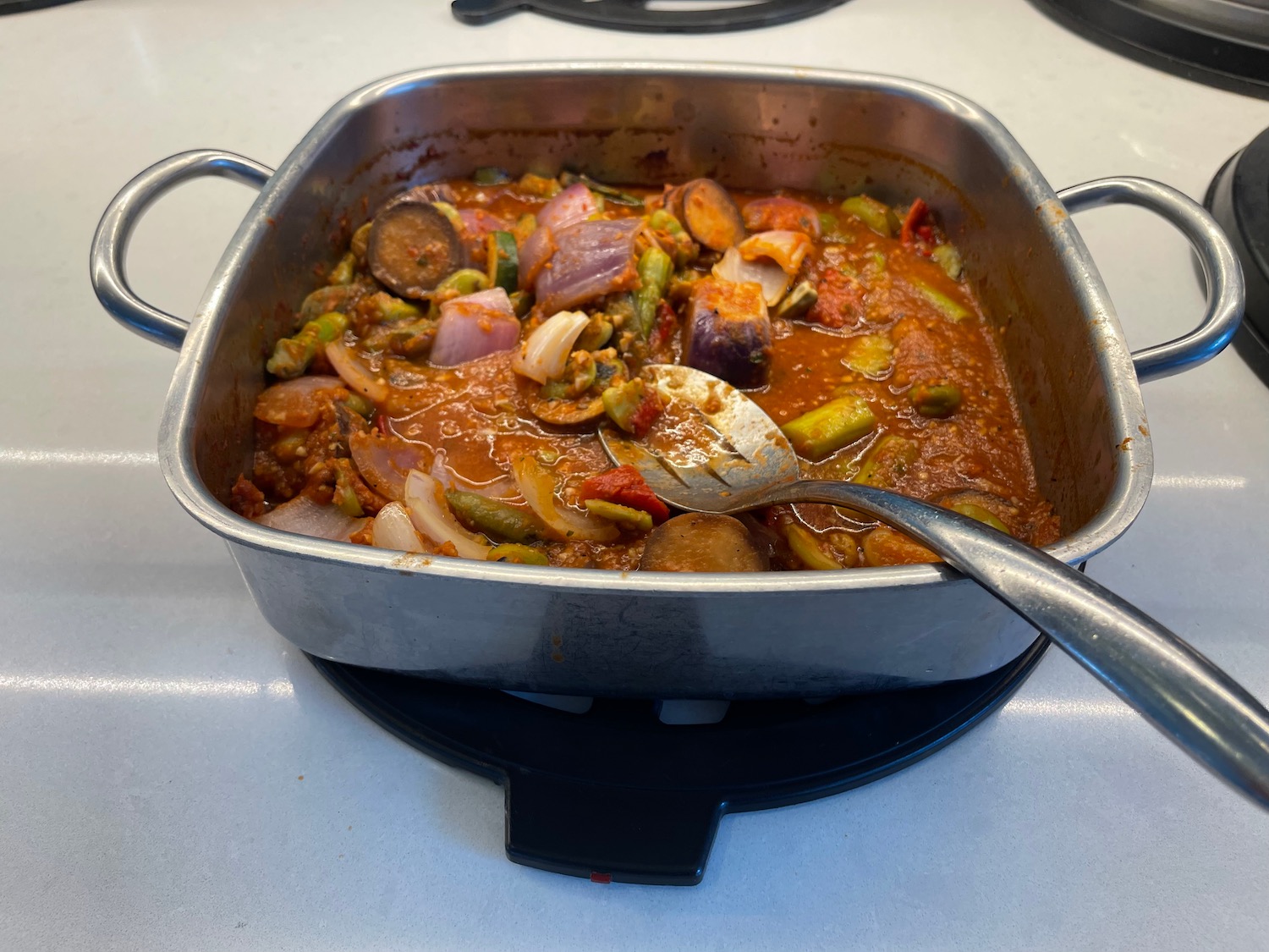 a pan of food on a stove