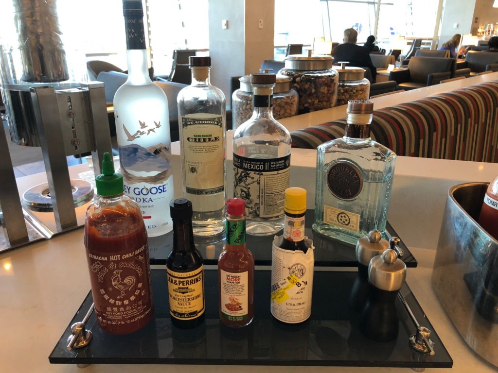 a group of bottles of alcohol on a table