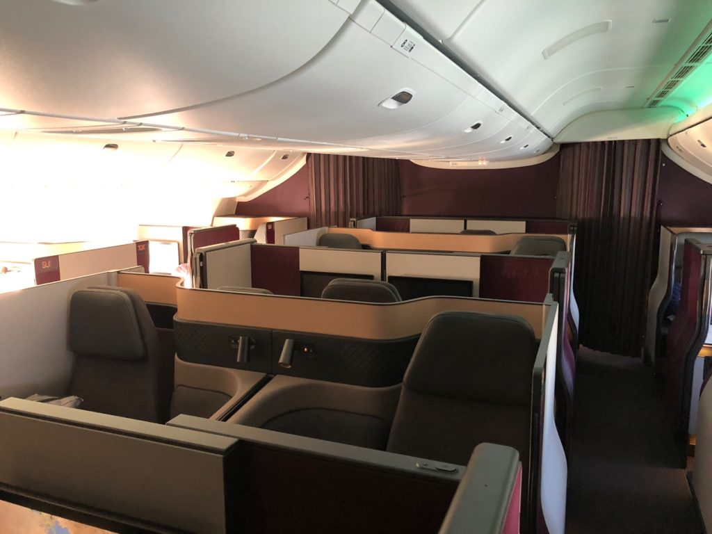 Review: Qatar Airways 777-300ER Qsuite Business Class New York to Doha ...