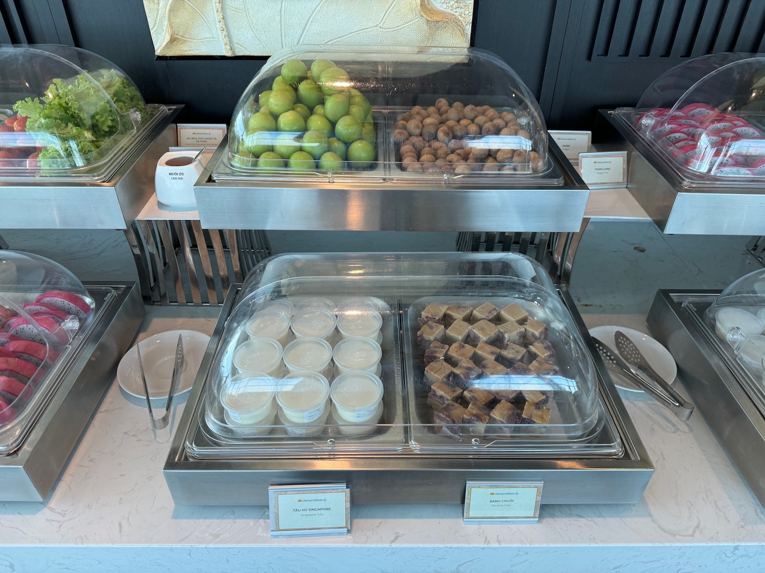 food in a buffet with food in containers