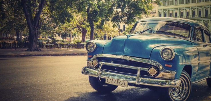 a blue car on the road