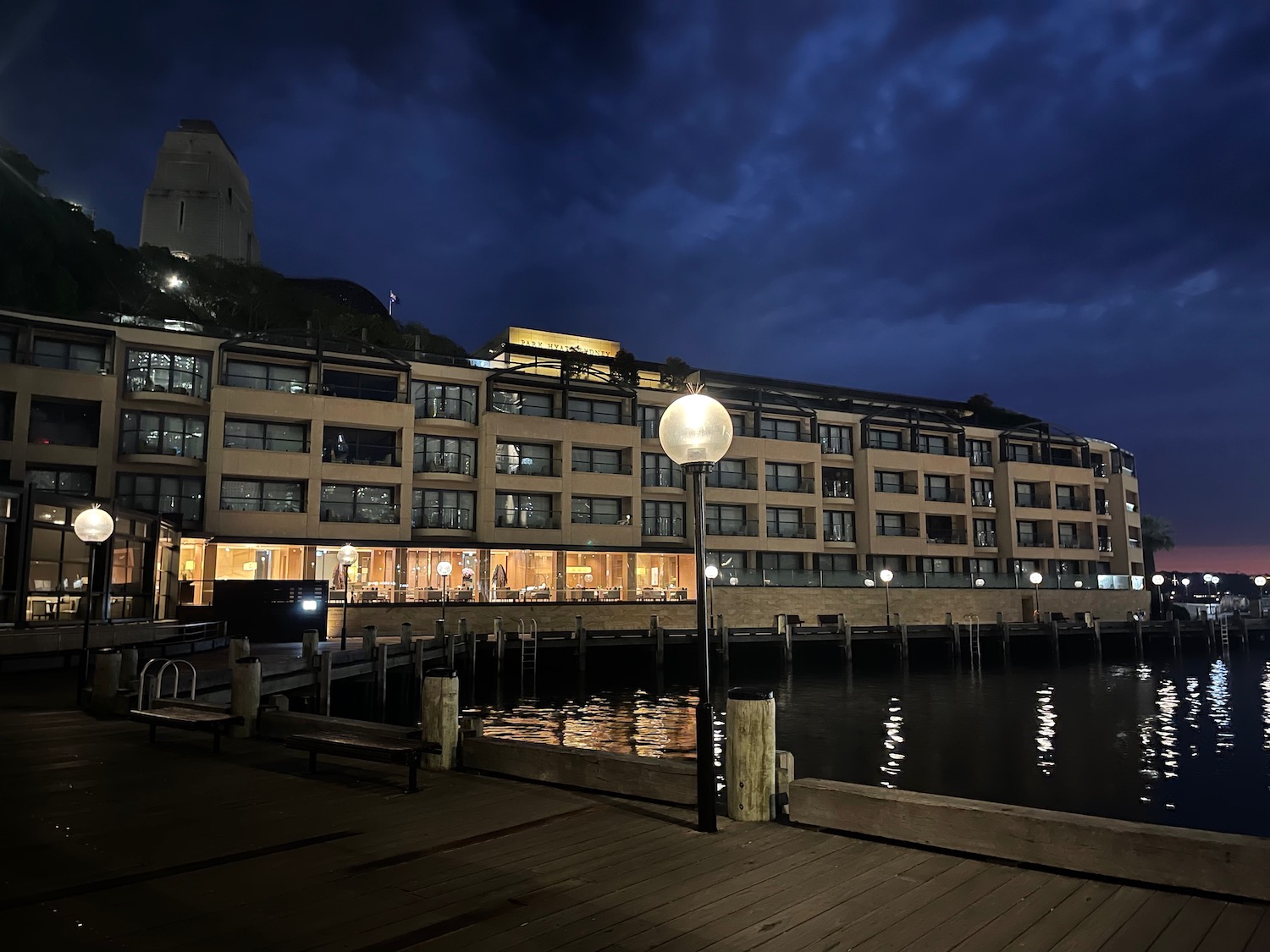 a building next to a body of water