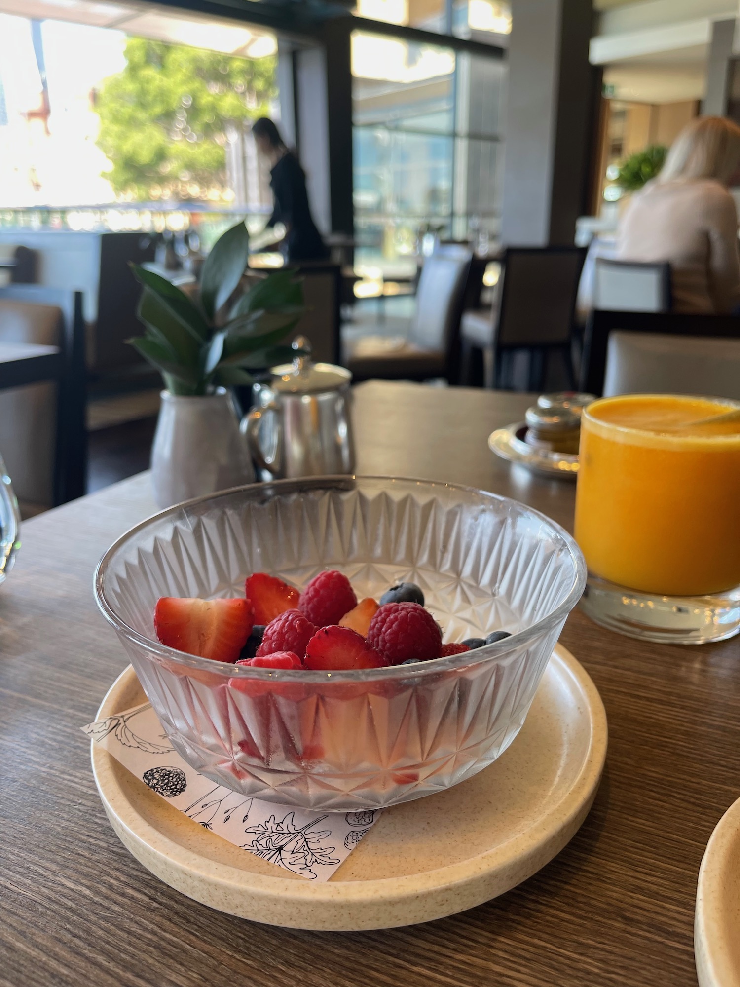 a bowl of fruit on a plate