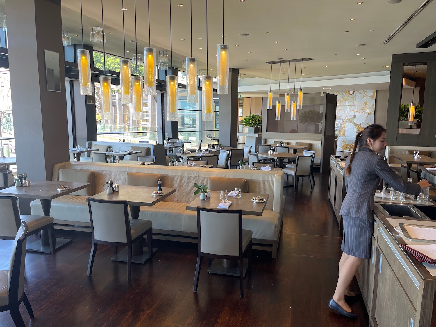 a woman kissing her face in a restaurant