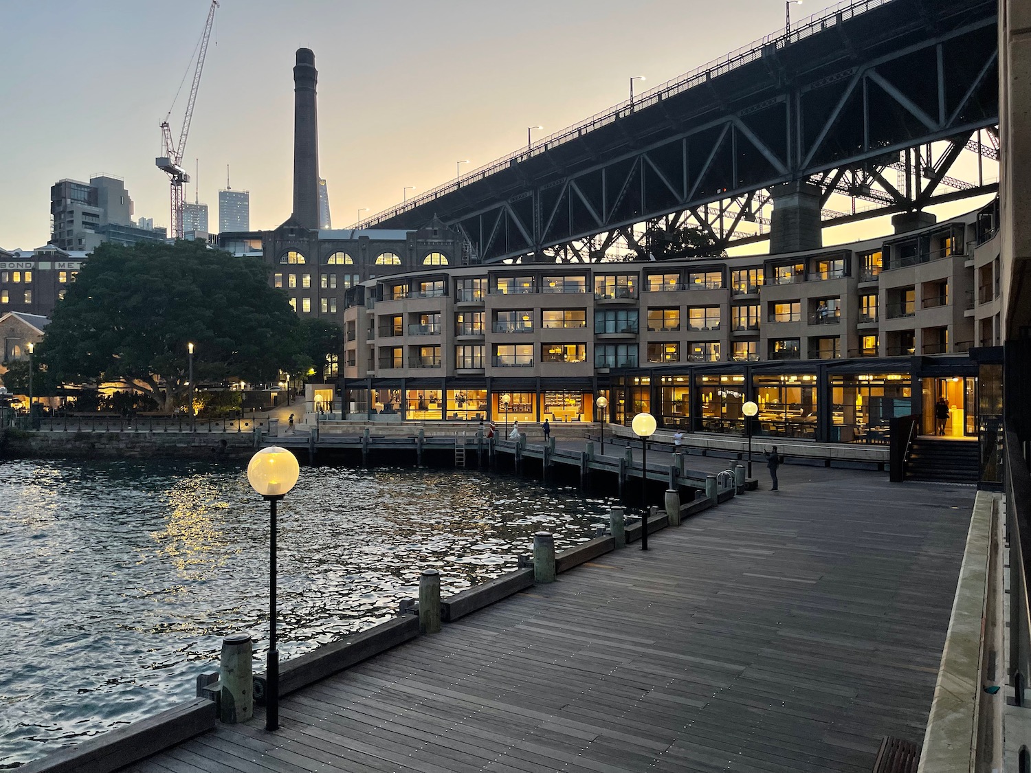 a walkway next to a body of water