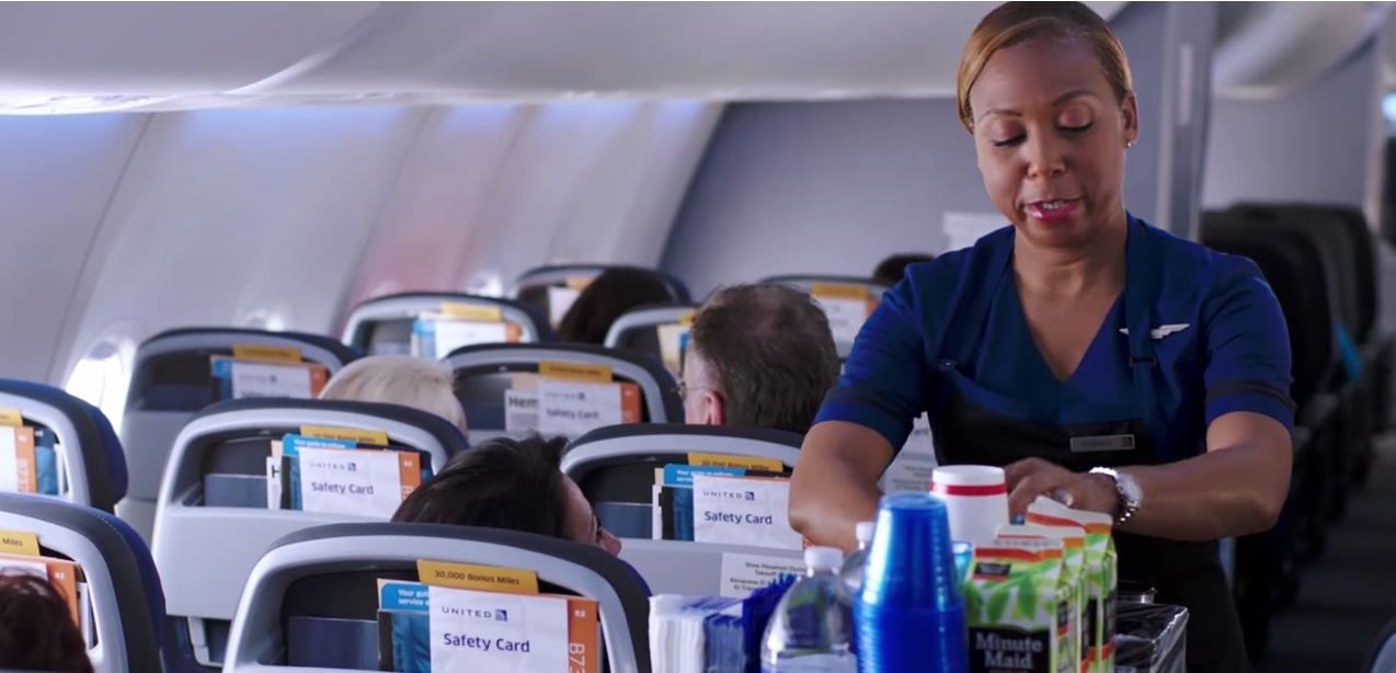 a woman working on an airplane