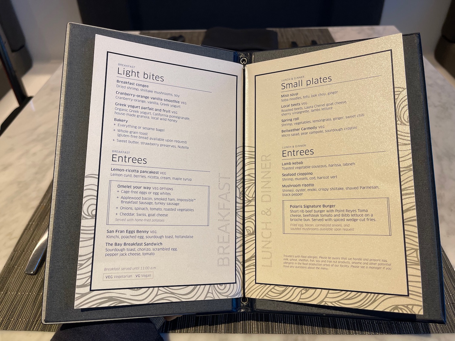 a menu open in a restaurant