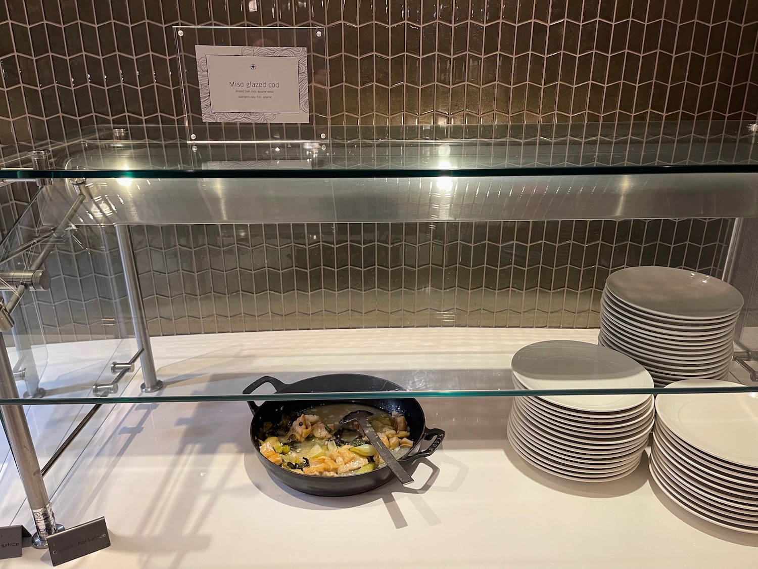 a pan with food on it on a glass shelf
