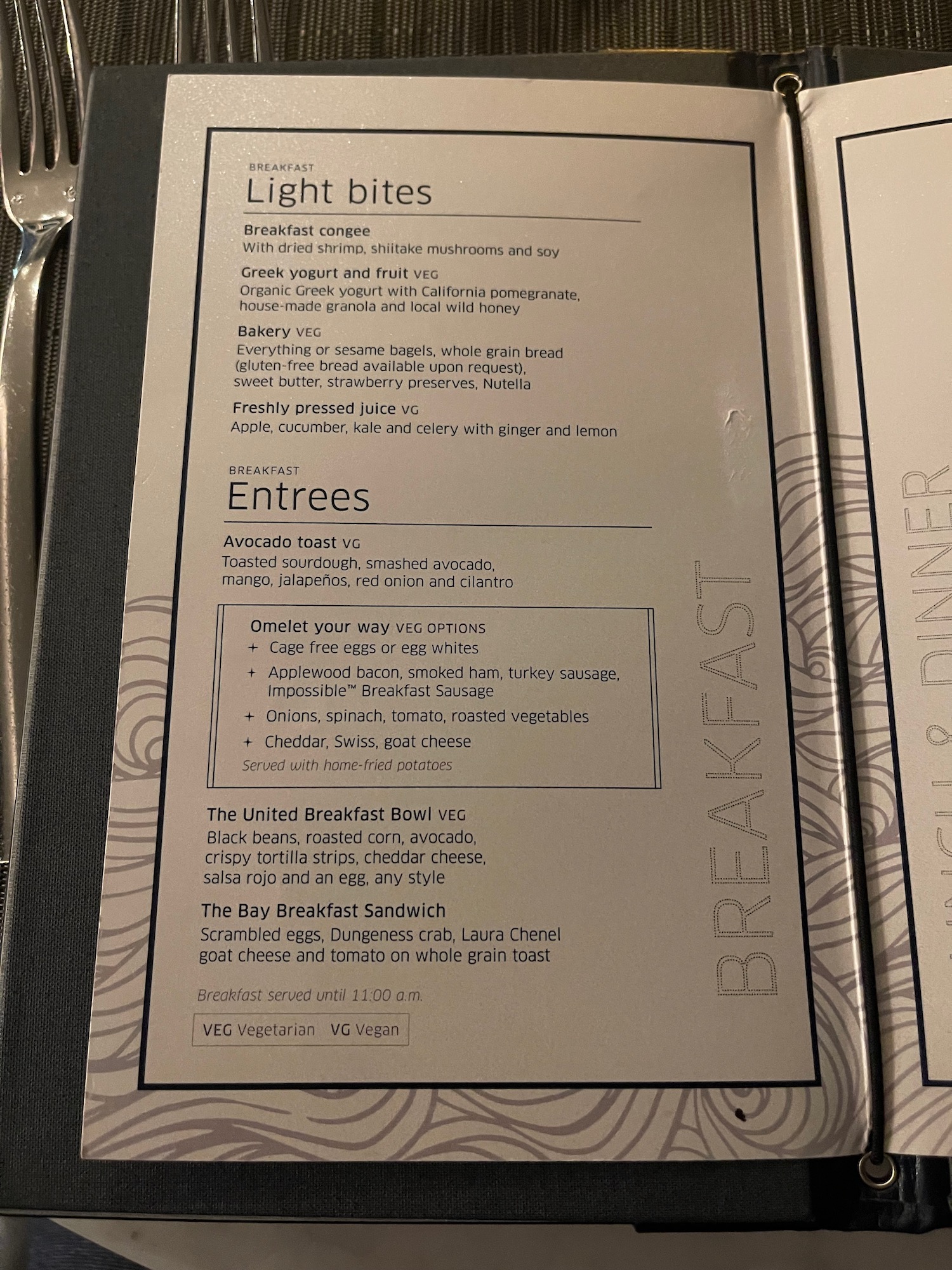 a menu with a fork and knife