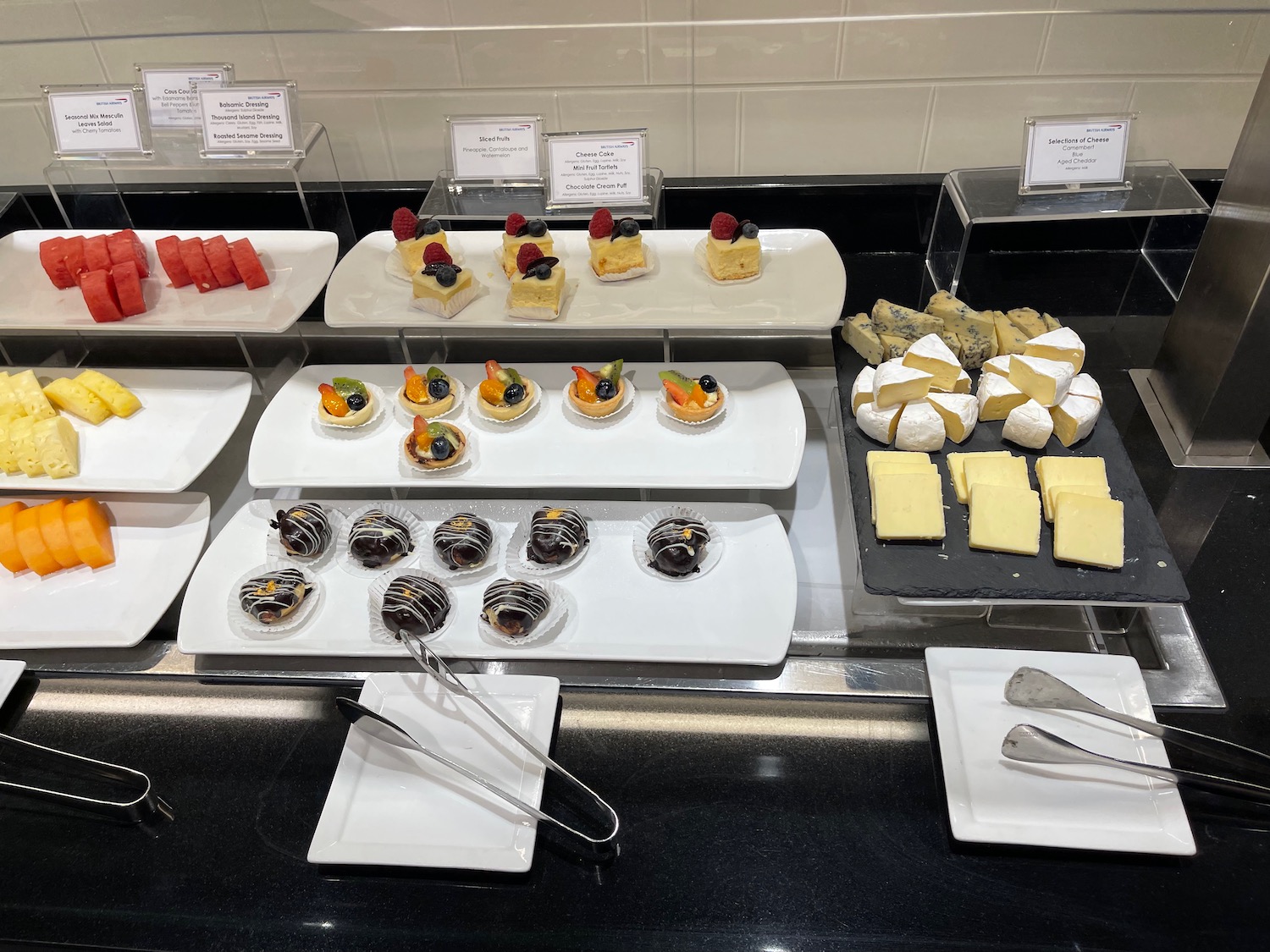 a buffet table with different desserts