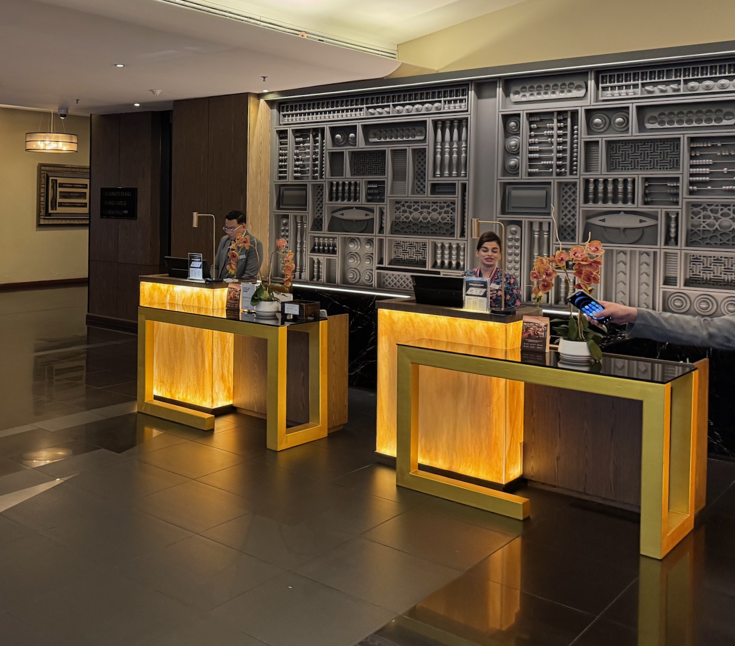a man at a desk in a hotel