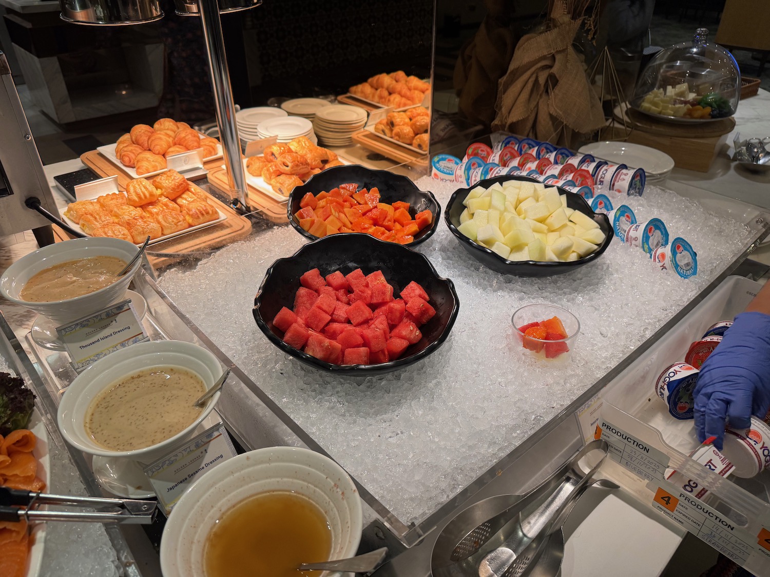 a buffet table with different foods on it