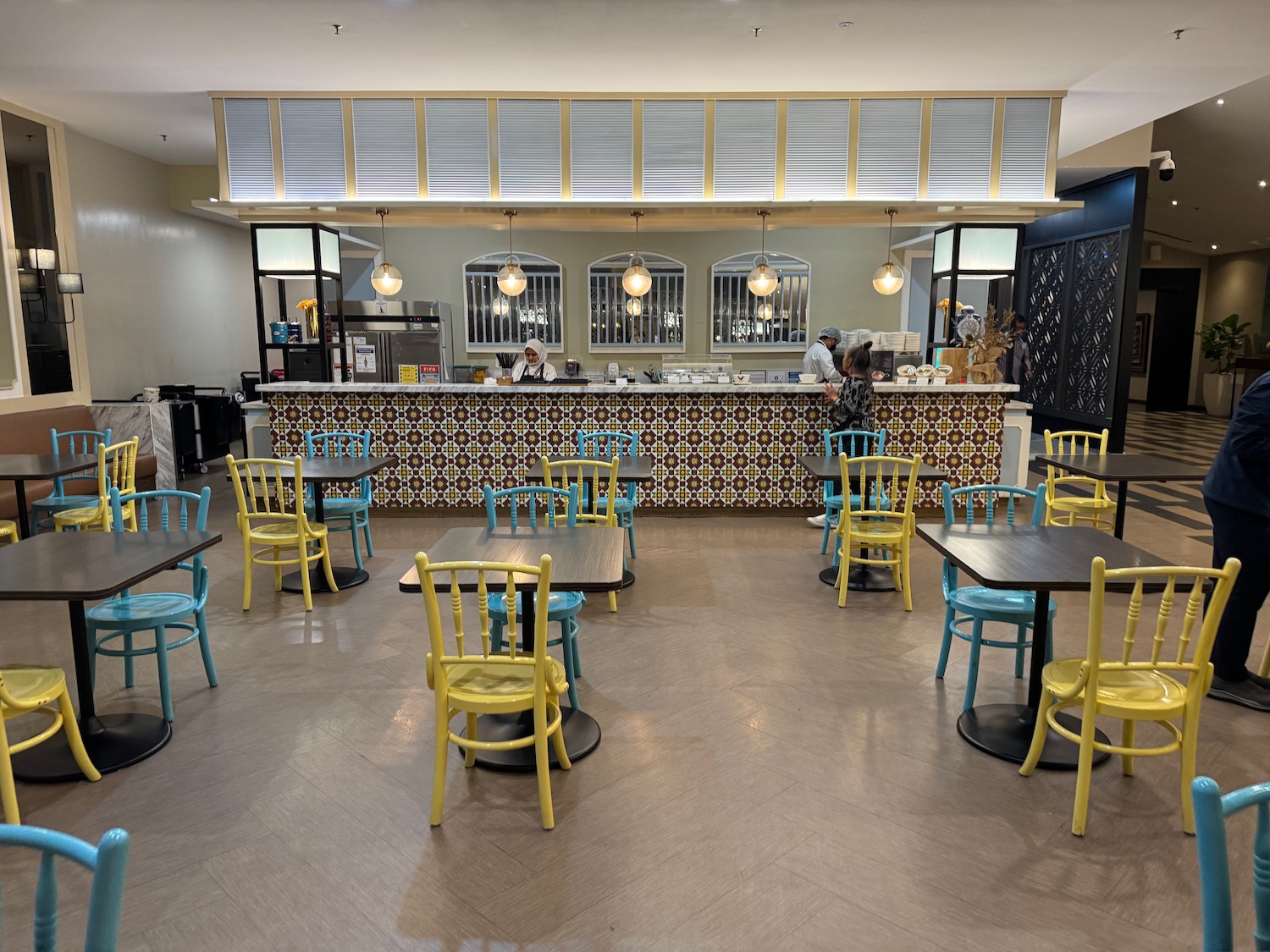 a room with tables and chairs