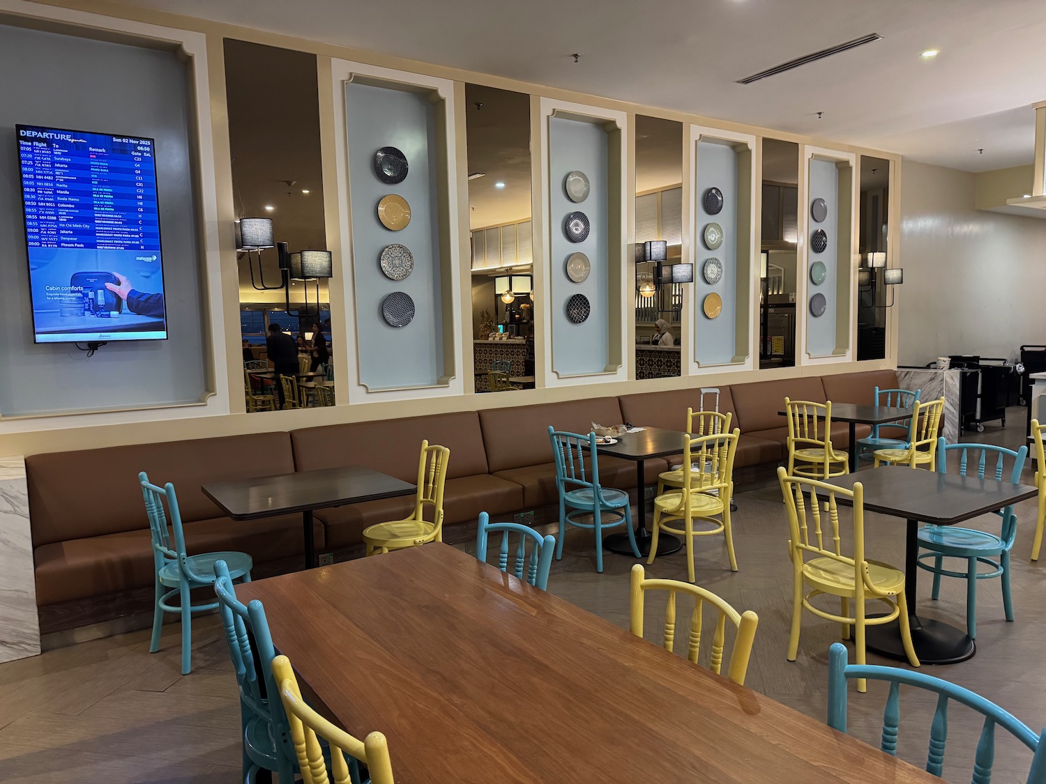 a room with tables and chairs