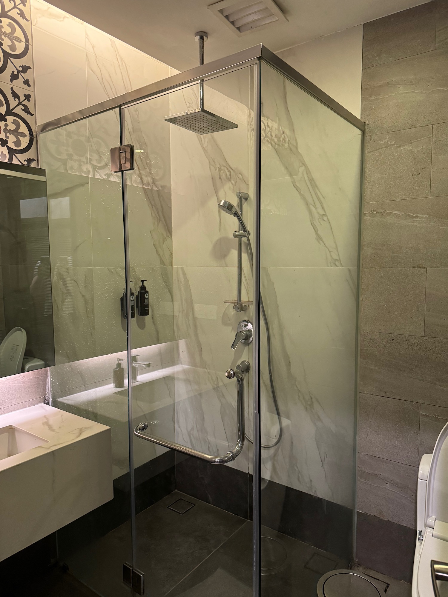 a shower with a glass door