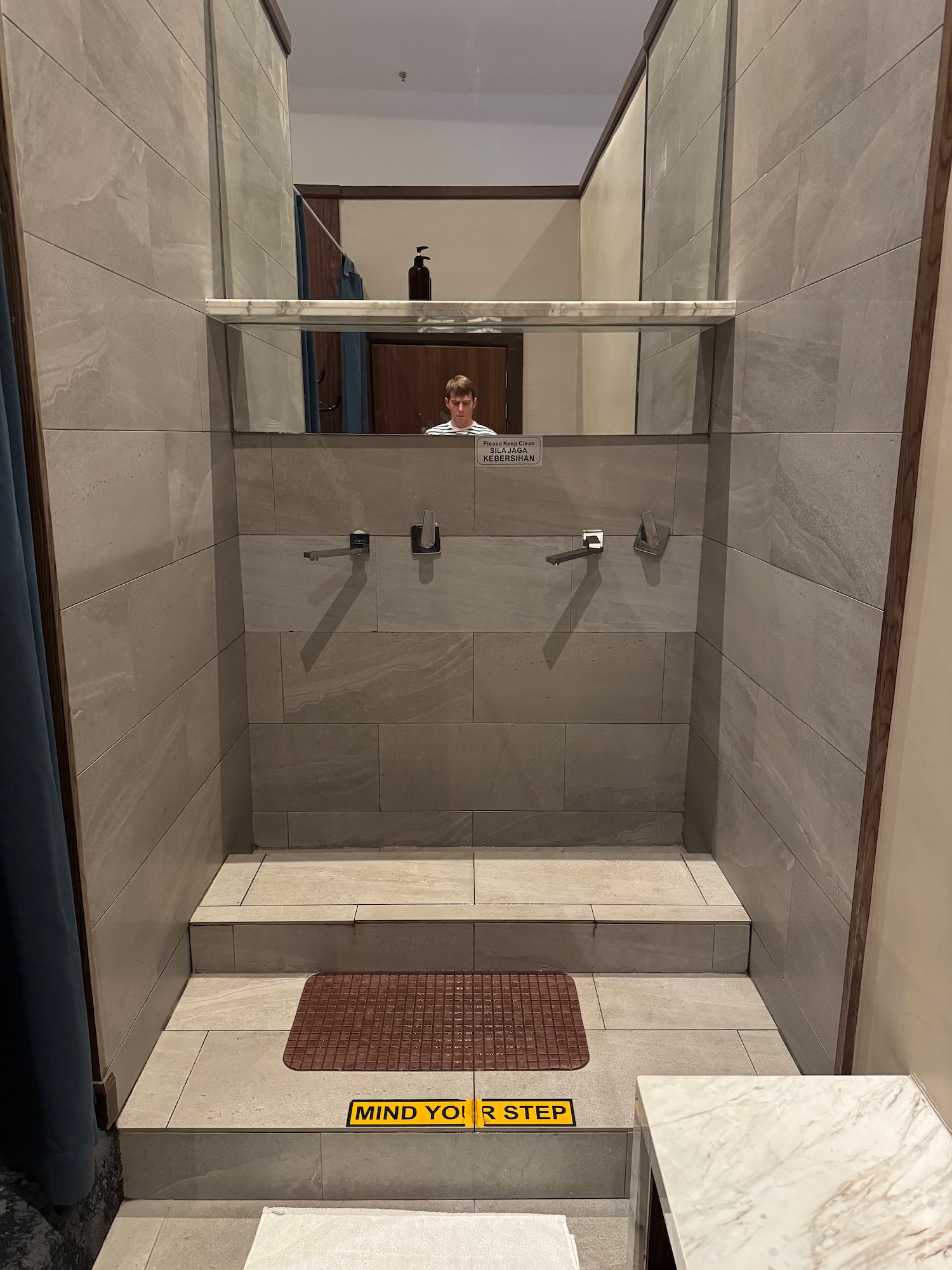 a person standing in a shower