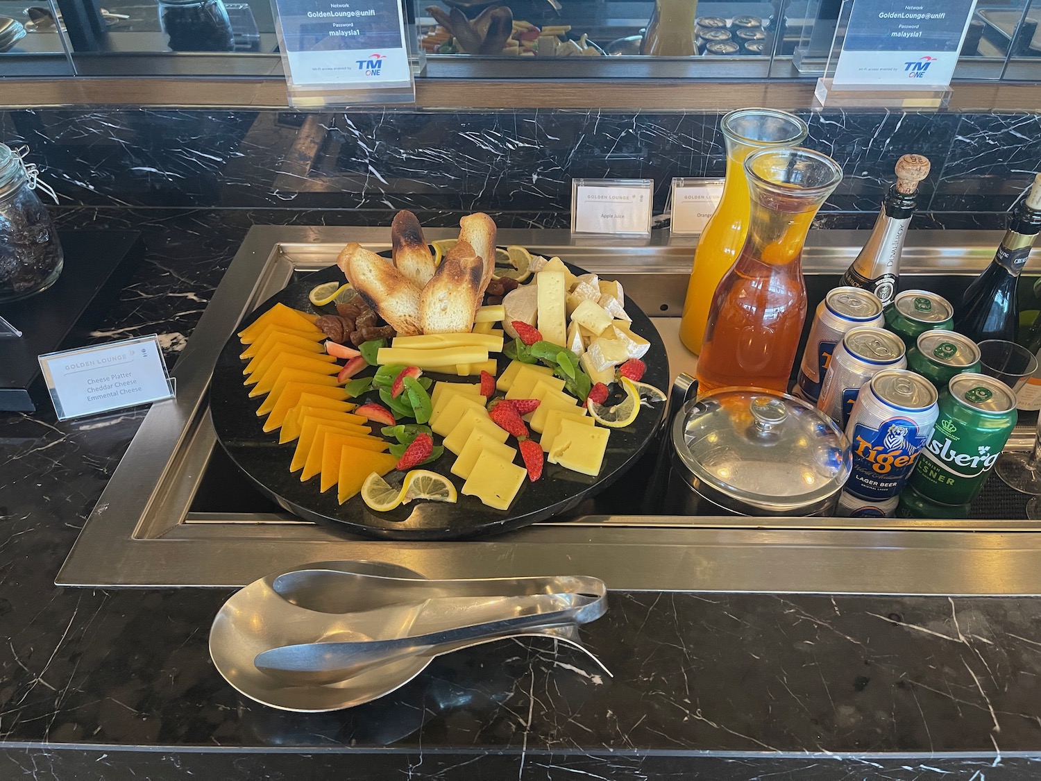 a tray of food and drinks on a counter