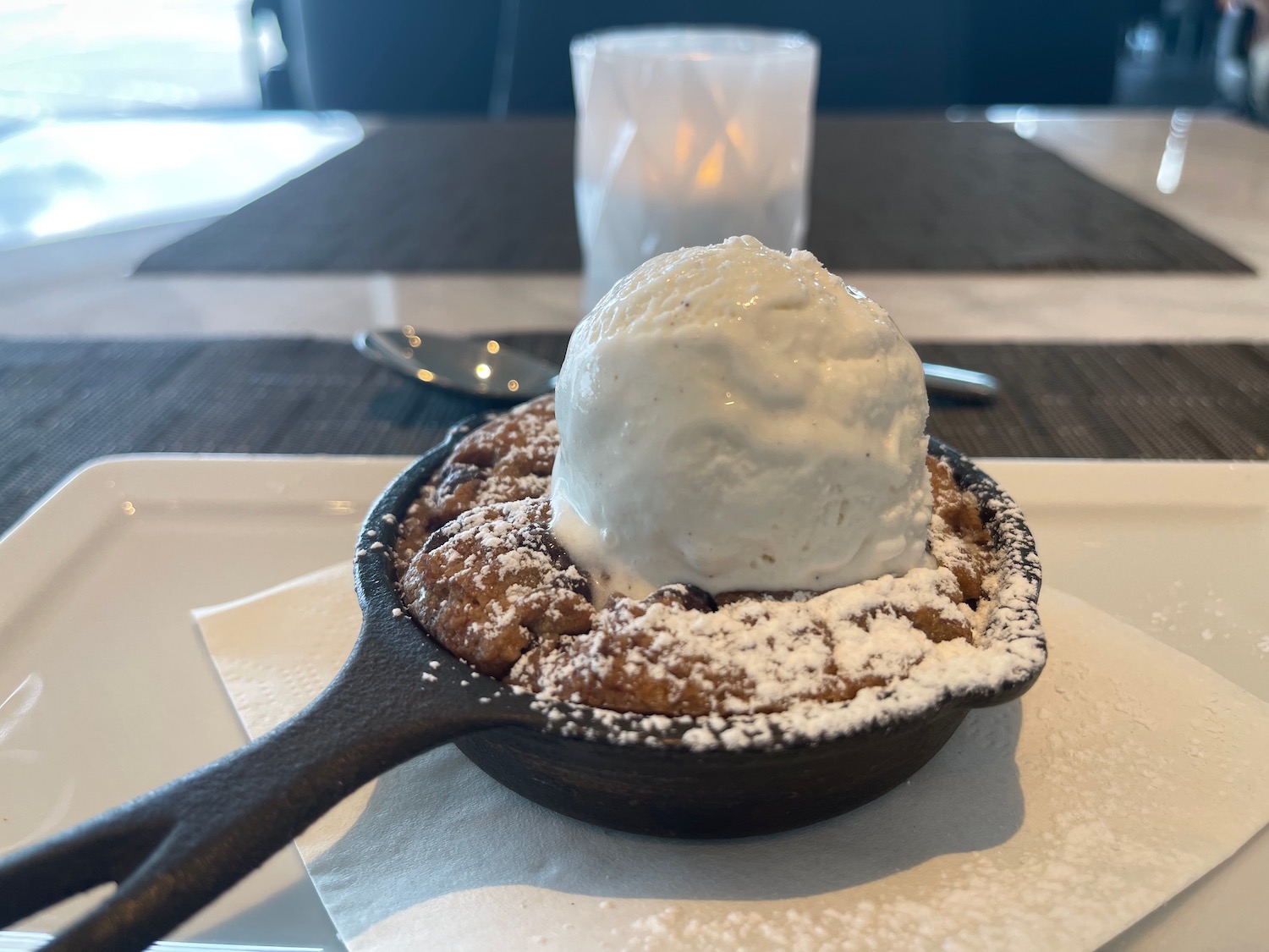 a skillet with a scoop of ice cream on it