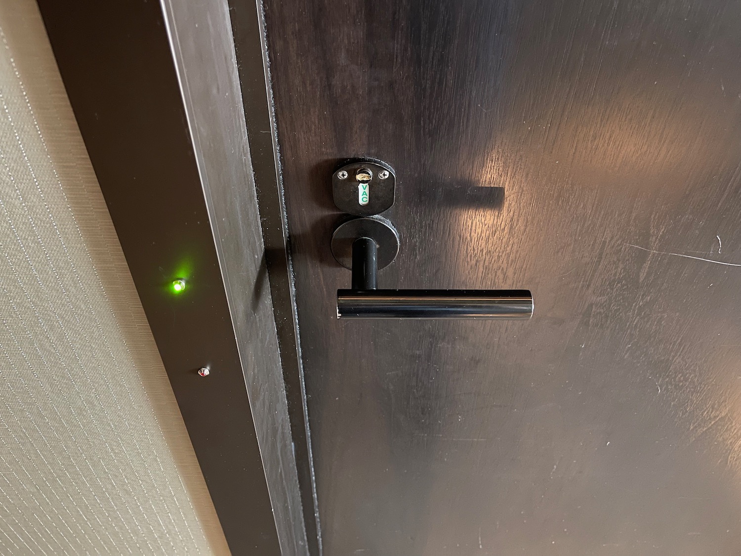 a door with a green light