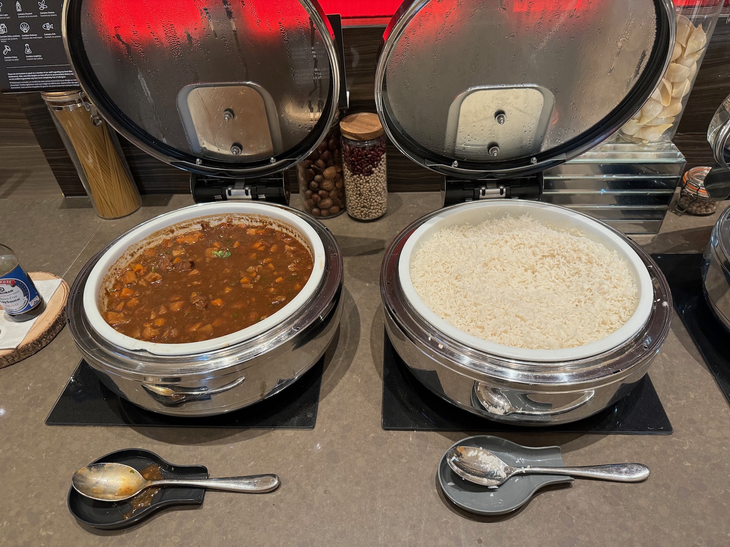 a two large containers with food in them